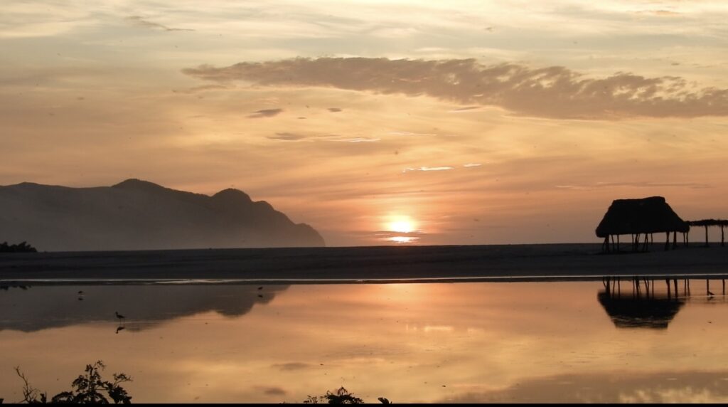 Sunrise by the beach palapa in Salina Cruz before a LunaCoral surf session