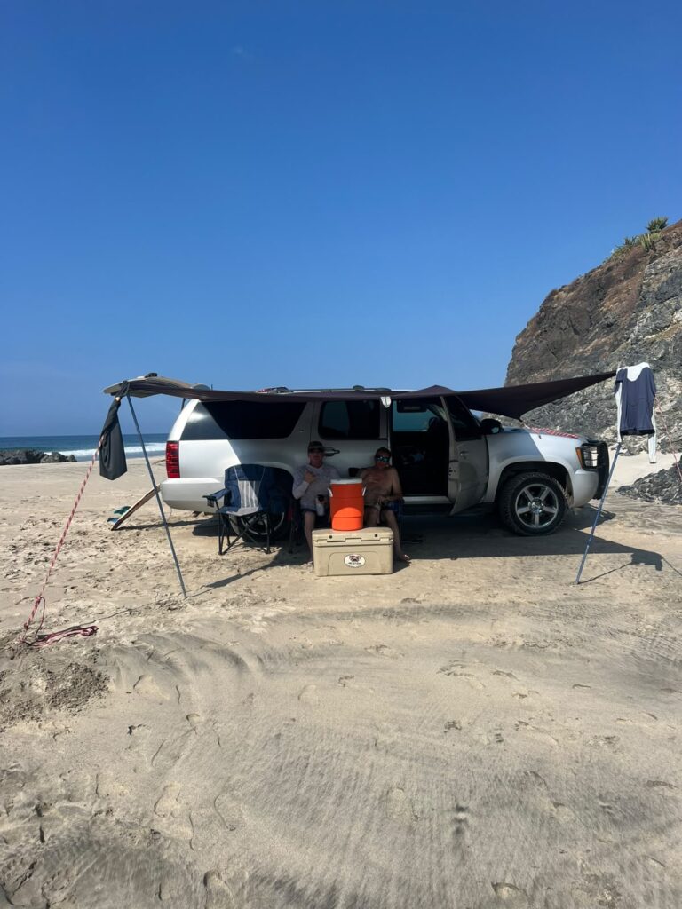 Point break setup with 4x4, shade, chairs and cooler during a Salina Cruz surf trip